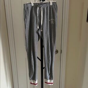 Roots Cabin Gray Track Pants with Red and White Accents